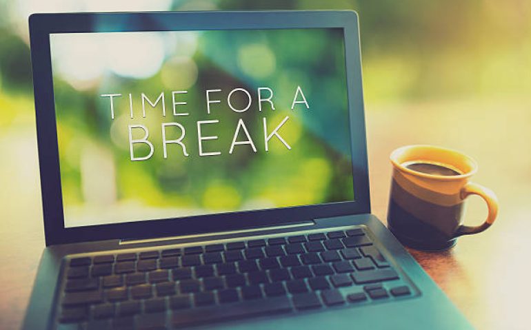 Coffee break at morning concept with laptop serene morning vintage editing style